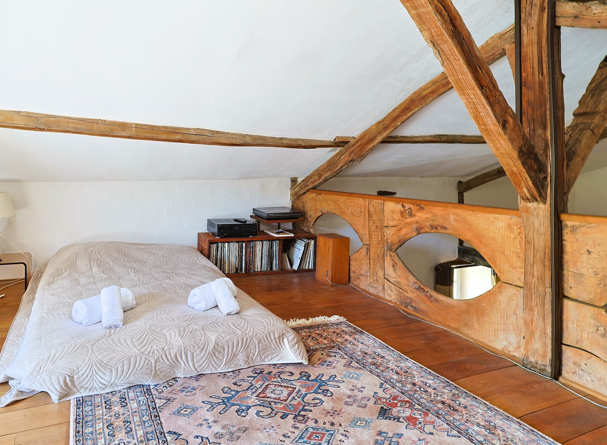 The mezzanine at The Friends' House, with its futon, record player and vinyl collection.