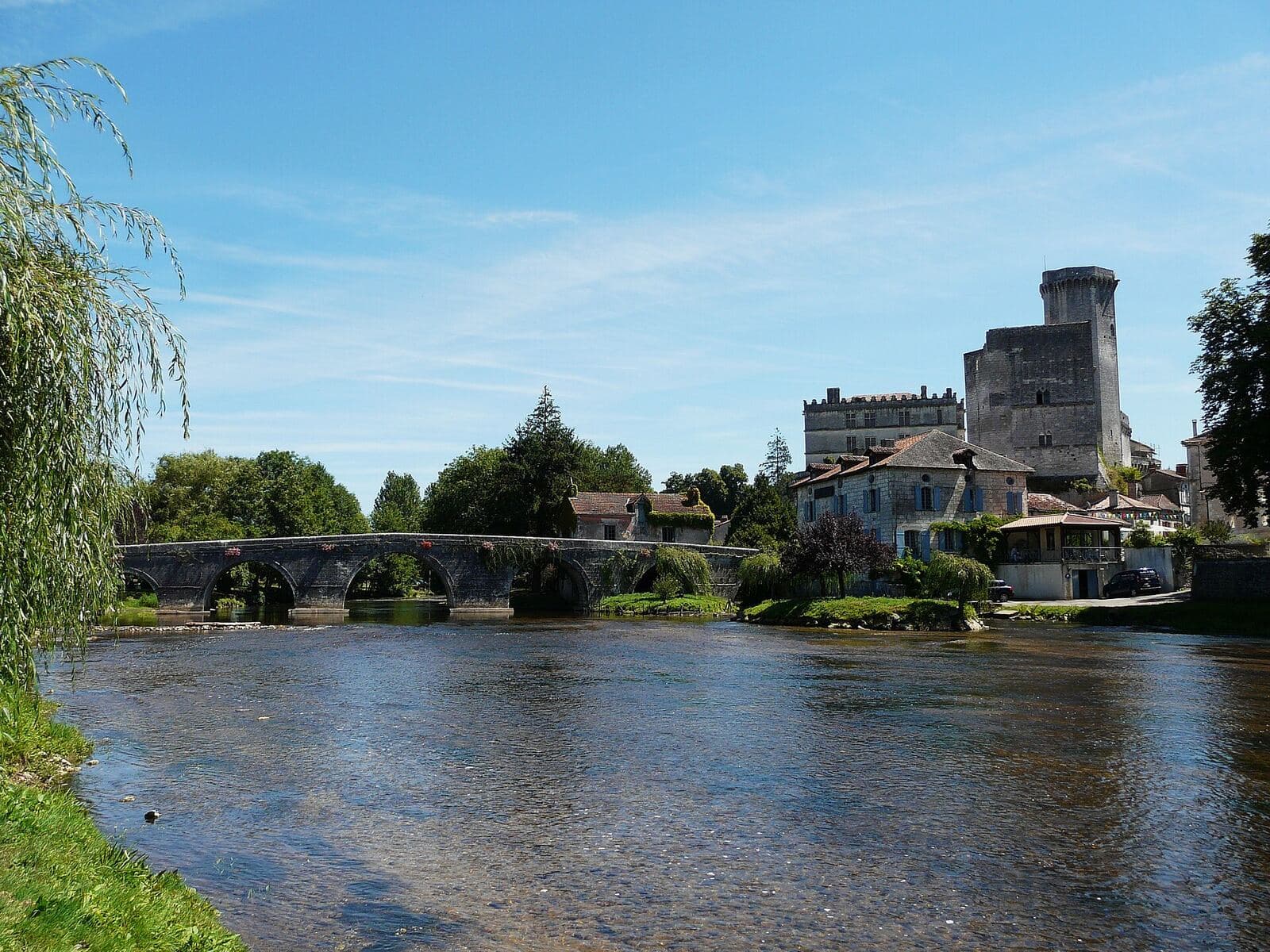 The old bridge at Bourdeilles over the Dronne, with the two châteaux above the village.